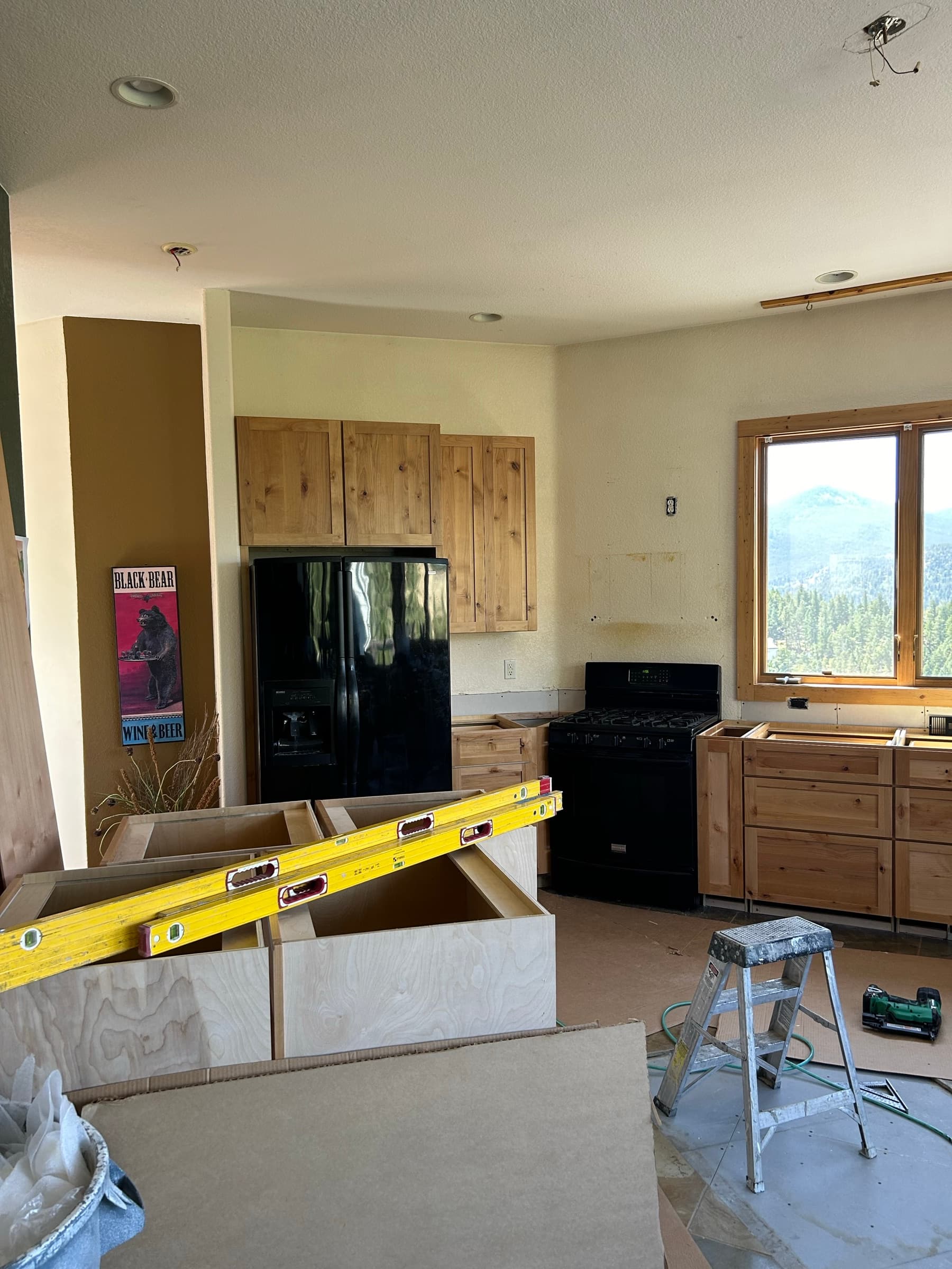 Kitchen island frame and pine cabinets during the remodel