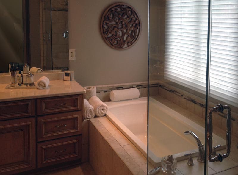 Bathroom with a double vanity, soaking tub, and tile, Far Hills, New Jersey