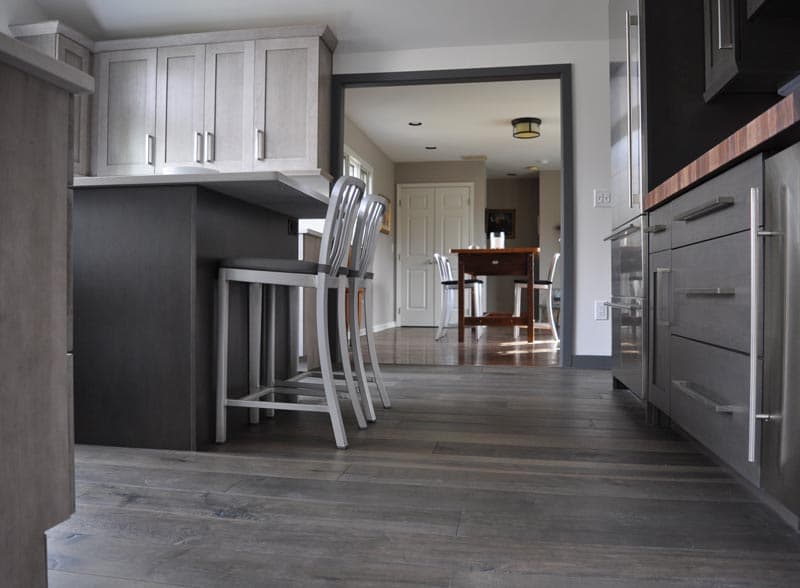 Gray-toned kitchen with a breakfast bar and tile floor, Oldwick, New Jersey