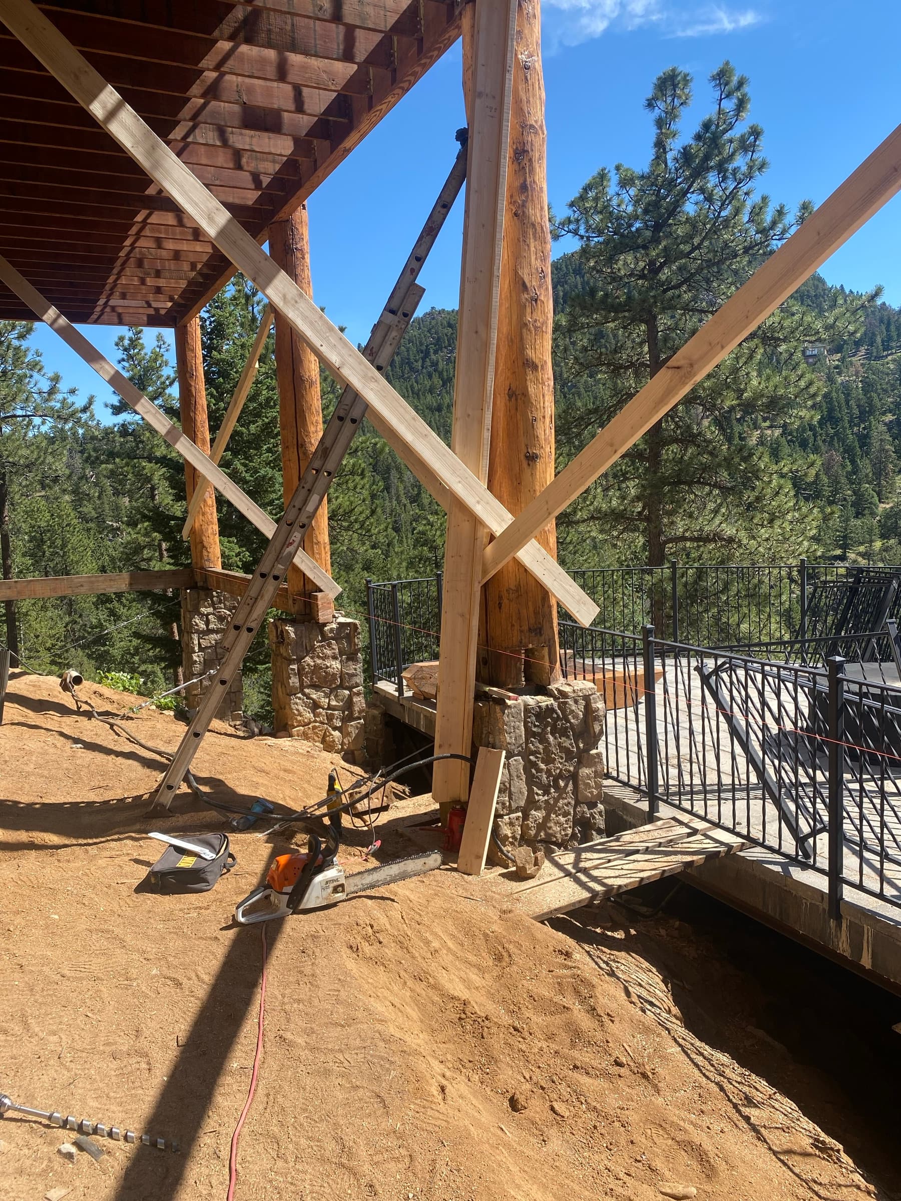 Log-house deck construction on a slope