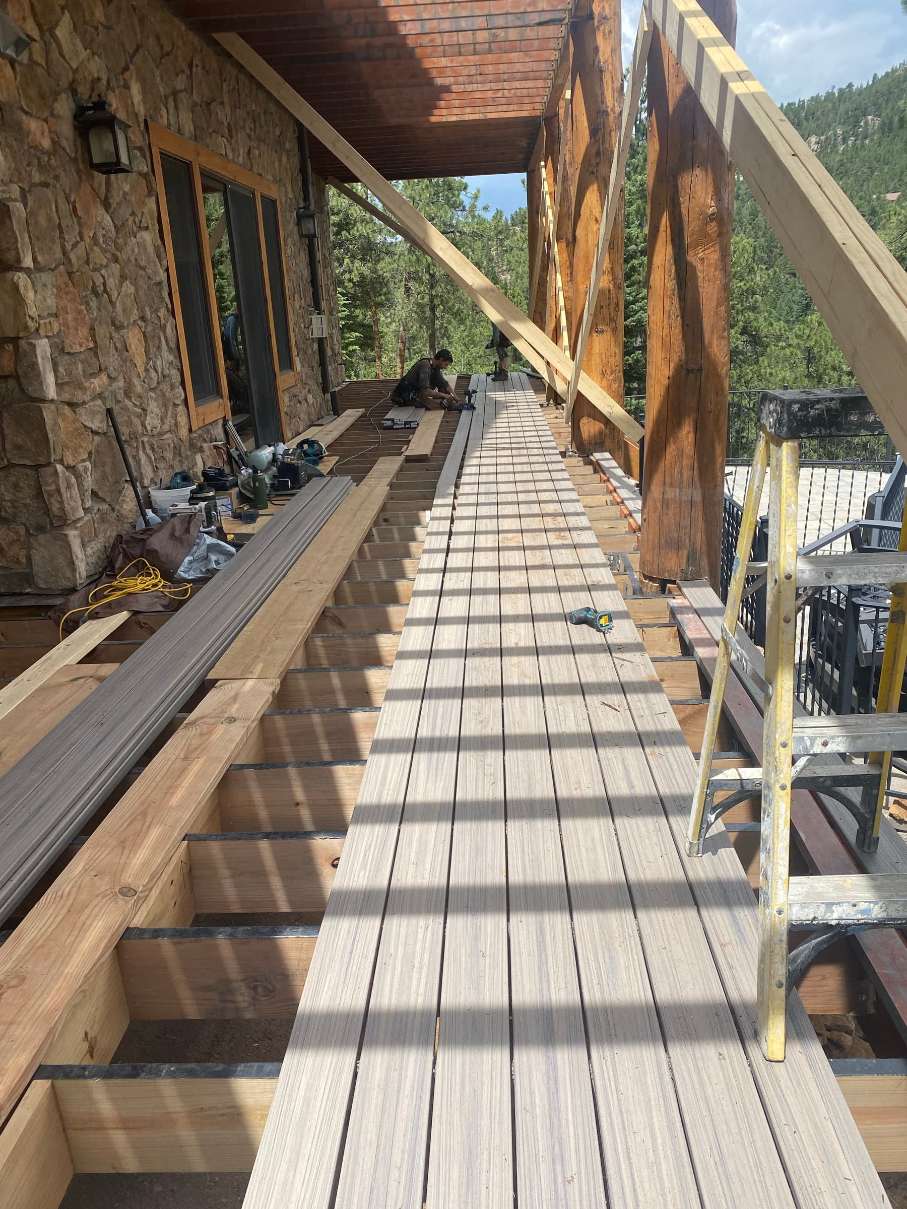 Composite decking and log columns during the rebuild